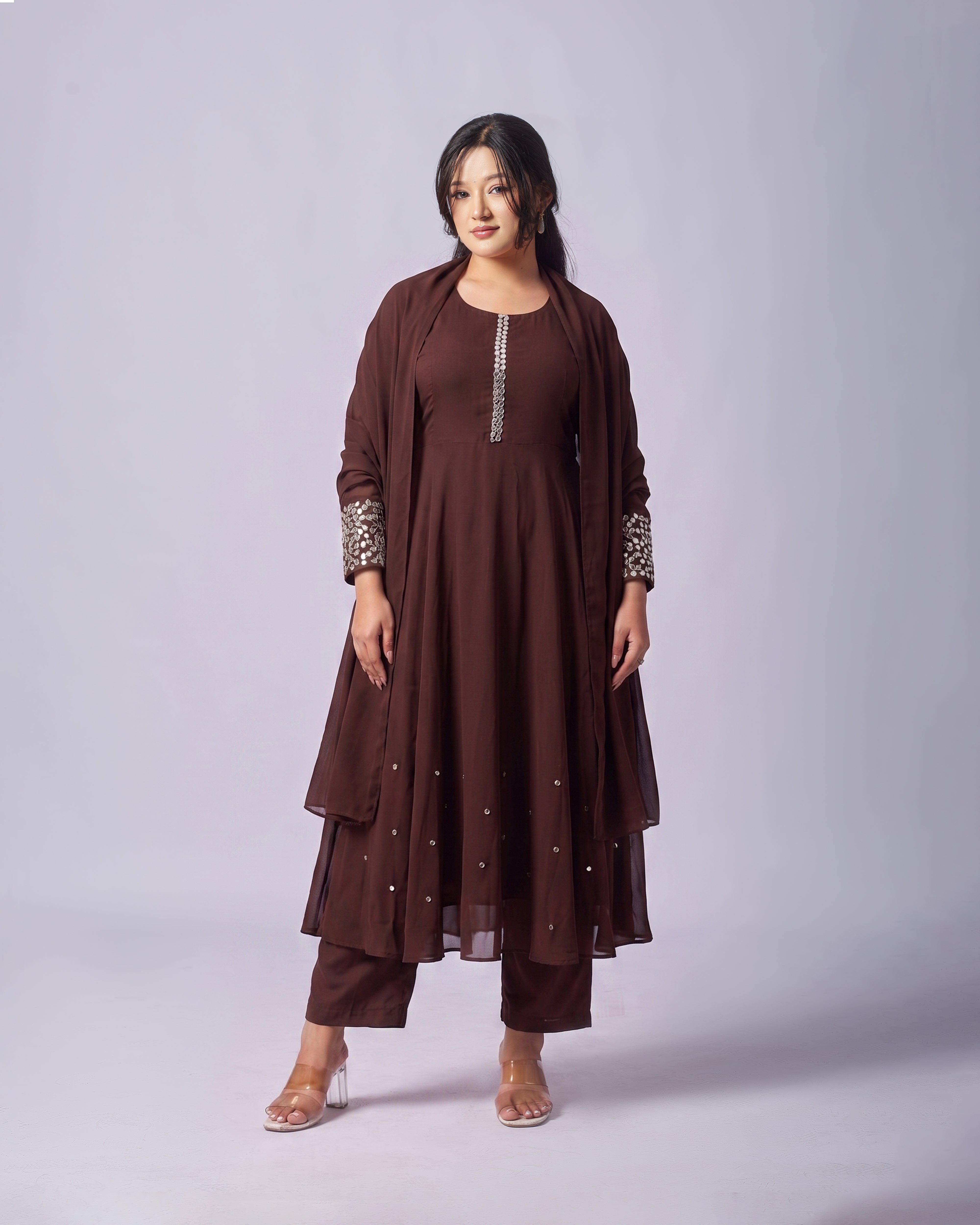 Elevate your everyday elegance with the Mayju Elegant Brown Chinon Silk Kurthi Set, a perfect blend of sophistication and comfort. 