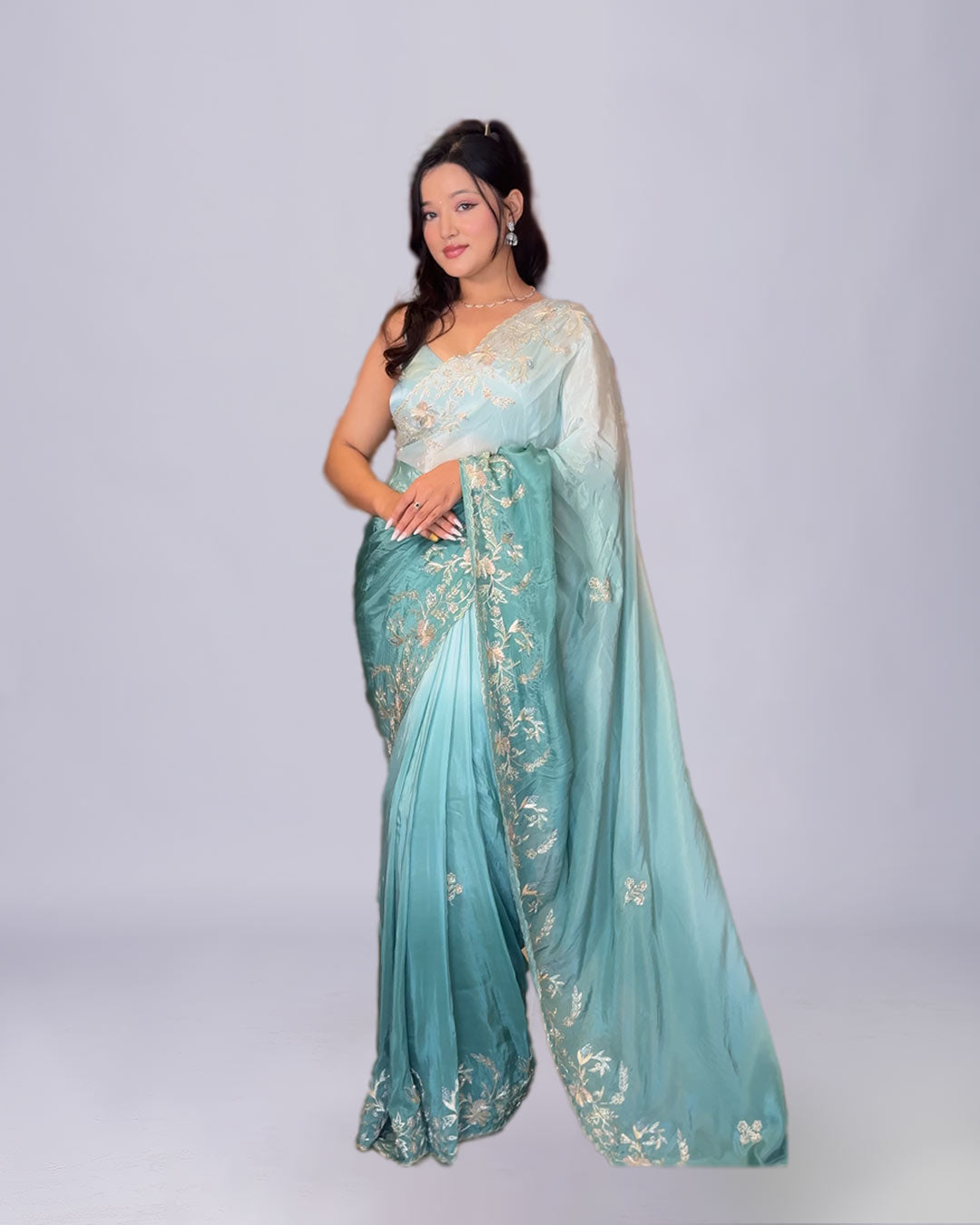 Aqua Grace Crepe Silk Saree with Hand Embroidered Floral Accents