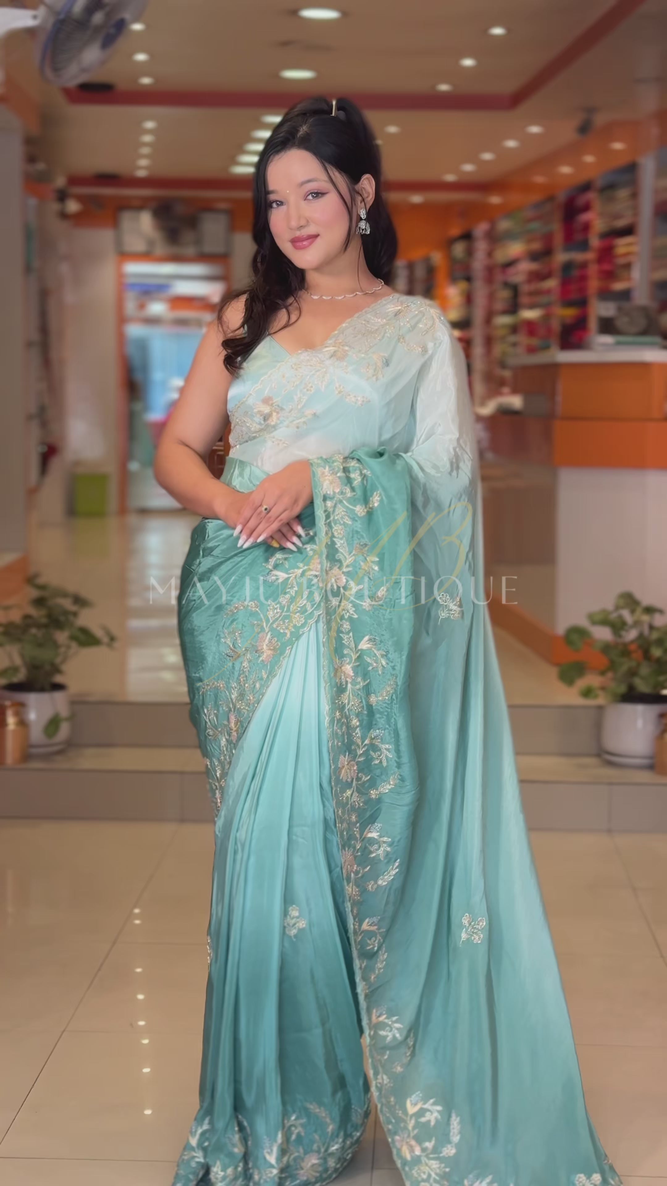 Aqua Grace Crepe Silk Saree with Hand Embroidered Floral Accents